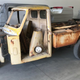 Illustration for article titled You Know The Economy Is Bad When 'Bring A Trailer' Is Offering This Rusty Shitbox Mitsubishi Three-Wheeler